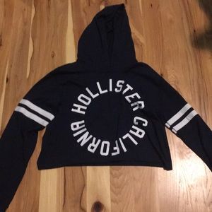Blue and white Hollister cropped hoodie.